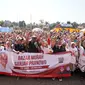 Relawan pendukung bakal calon presiden (capres) Ganjar Pranowo yaitu Sahabat Ganjar menyelenggarakan senam sehat di Kecamatan Belimbing, Kota Malang dan bazar murah di Jember, Jawa Timur pada Minggu (1/10/2023). (Istimewa)