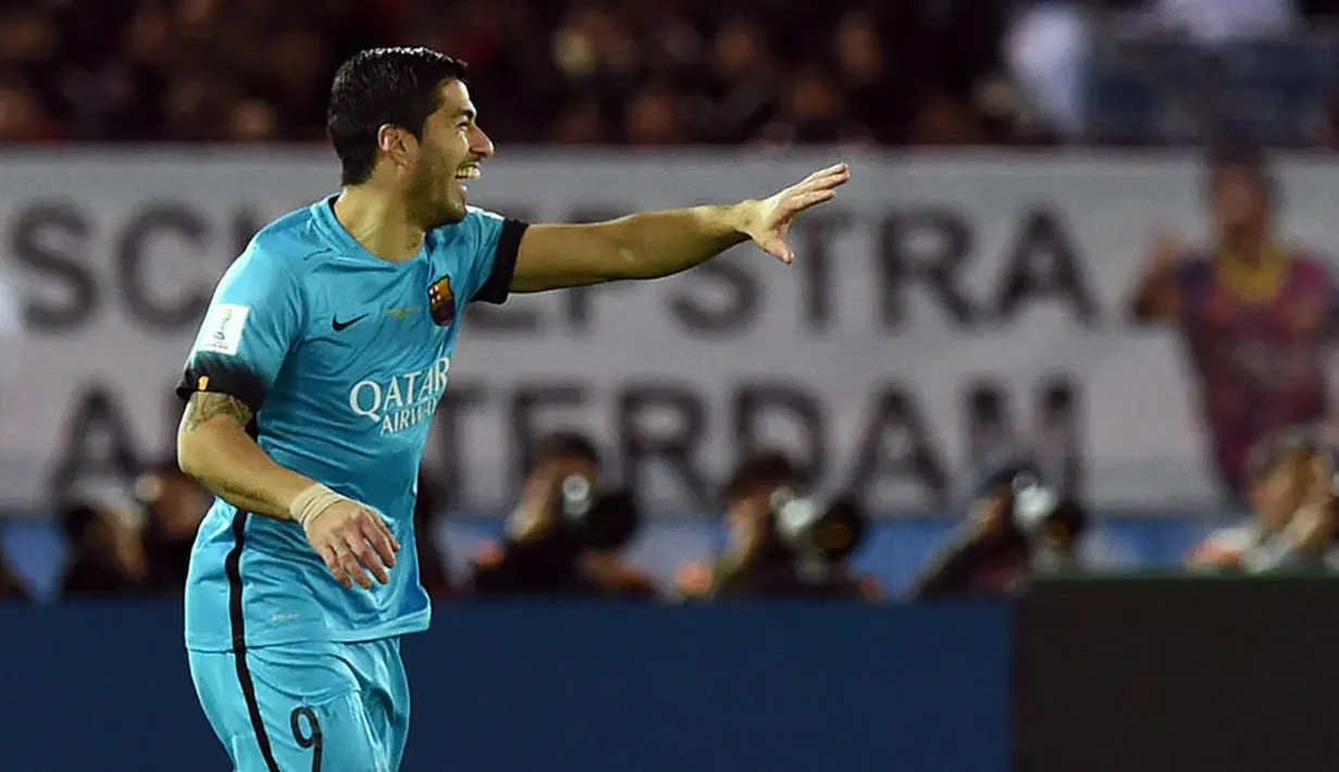Keriangan Luis Suarez usai membobol gawang Guangzhou Evergrande pada semifinal Piala Dunia Antarklub. (AFP/Toshifumi Kitamura)