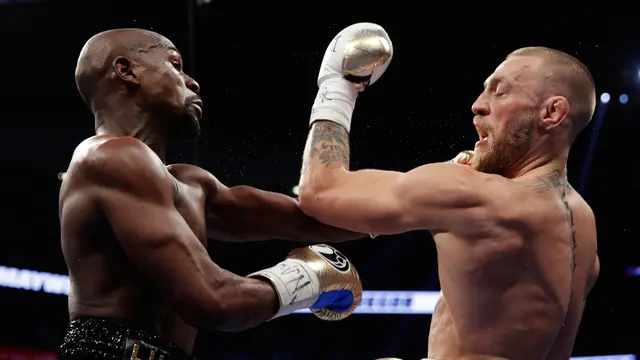 Taklukan McGregor, Mayweather Jr Menang TKO di Ronde ke-10