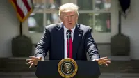 Donald Trump saat mengumumkan hengkangnya AS dari Kesepakatan Paris di Gedung Putih (1/6/2017) (AP Photo/Andrew Harnik)