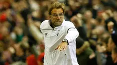  Pelatih Liverpool, Juergen Klopp melakukan selebrasi setelah bek liverpool Mamadou Sakho mencetak gol penyeimbang di perempat final UEFA Europa League antara Liverpool lawan Borussia Dortmund di stadion Anfield, Inggris, (14/4). (Reuters / Carl Recine)
