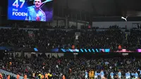 Papan skor menunjukkan gol gelandang Manchester City Phil Foden pada laga Piala FA melawan Port Vale di Etihad Stadium, Sabtu (4/1/2020) atau Minggu dini hari WIB. (AFP/Paul Ellis)