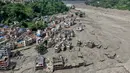 Sejumlah rumah tampak terendam berlumpur di tepi sungai setelah banjir bandang melanda Trishuli Bazar di distrik Nuwakot, Nepal, Rabu, 26 Agustus 2026. (AFP/ Prabin Ranabhat)