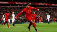 Ekspresi pemain Liverpool, Emre Can, setelah mencetak gol ke gawang Watford di Stadion Anfield pada laga lanjutan Premier League 2016-2017, Minggu (6/11/2016). (Action Images via Reuters/Jason Cairnduff)
