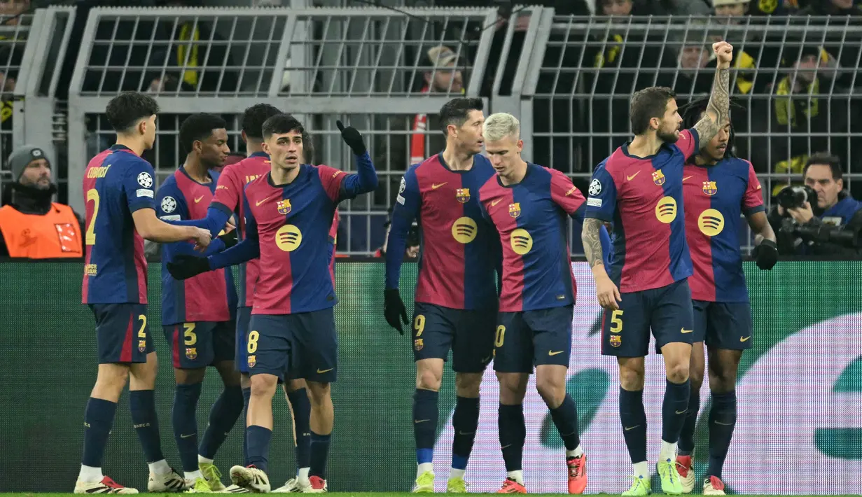 Bertanding di markas Borussia Dortmund, Barcelona menang dengan skor 3-2. (INA FASSBENDER/AFP)
