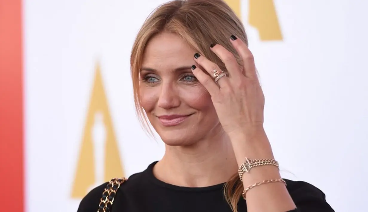 Cameron Diaz dan Benji Madden berpacaran pada May 2014 dan kemudian bertunangan beberapa bulan kemudian. Mereka pun menikah pada Januari 2015. (ROBYN BECK / AFP)