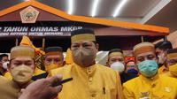 Airlangga Hartarto saat hadiri HUT ke 62 MKGR di Makassar (Liputan6.com/Fauzan)