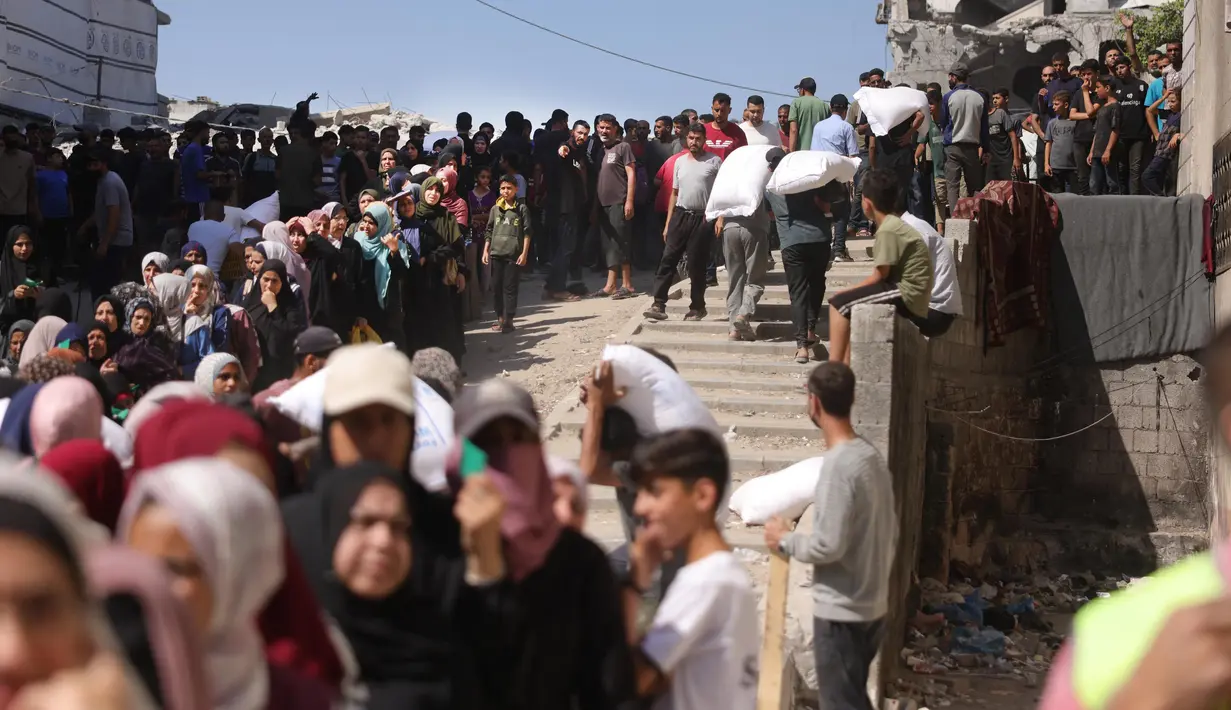 Terbaru, dalam pendistribusian bantuan pada Selasa (24/6/2025) di Gaza, 44 warga tewas. (BASHAR TALEB/AFP)