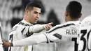 Bintang Juventus, Cristiano Ronaldo merayakan gol yang dicetaknya ke gawang Crotone dalam lanjutan Liga Italia di Allianz Stadium, Selasa dinihari WIB (23/2/2021). Cristiano Ronaldo menyumbang dua gol pada laga ini, sedangkan satu gol lagi disumbang Weston McKennie. (Marco Alpozzi/LaPresse via AP)