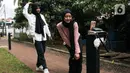 Pemerintah Provinsi Jakarta menegaskan bahwa pembuatan konten oleh masyarakat di taman yang dikelola Dinas Pertamanan dan Hutan Kota (Distamhut), tidak perlu izin dan bayar. (Magang/Liputan6.com/Muhammad Rizal)
