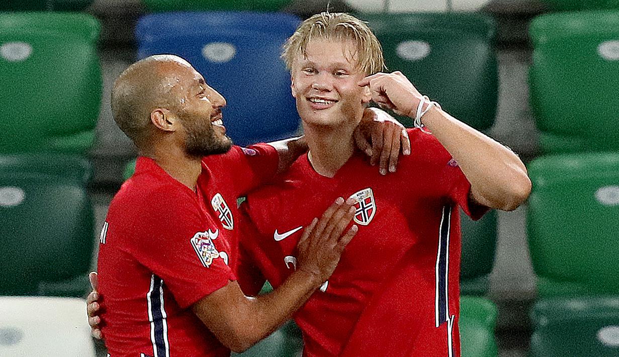 Penyerang Norwegia, Erling Braut Haaland, merayakan gol yang dicetaknya ke gawang Irlandia Utara pada laga UEFA Nations League di Windsor Park, Selasa (8/9/2020) dini hari WIB. Norwegia menang telak 5-1 atas Irlandia Utara. (AFP/Paul Faith)