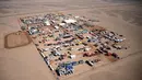 Pemandangan udara tempat beristirahat para pereli selama tahap 9 Dakar 2021 di Neom, Arab Saudi, (12/1/2021). Reli Dakar 2021 menempuh jarak total 7.646km yang terbagi dalam 12 etape. (AFP/Franck Fife)