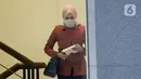 Istri mantan Sekretaris MA Nurhadi, Tin Zuraida saat akan menjalani pemeriksaan di Gedung KPK, Jakarta, Senin (22/6/2020). Tin diperiksa sebagai saksi untuk tersangka Direktur MIT Hiendra Soenjoto terkait dugaan suap gratifikasi pengurusan perkara di MA tahun 2011-2016. (merdeka.com/Dwi Narwoko)
