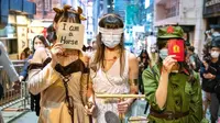 Kasus Covid-19 Meningkat Usai Halloween, Hong Kong Wajibkan Pendatang Karantina di Hotel