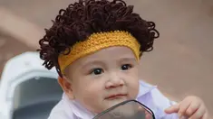 Rayyanza Malik Ahmad kini cosplay jadi anak SMA. Dia bahkan memakai wig rambut kriting. (Foto: Instagram/ raffinagita1717)