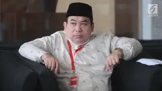Pihak pengelola pesantren, HMN Lesmana berada di ruang tunggu untuk menjalani pemeriksaan di Gedung KPK, Jakarta, Rabu (26/6/2019). Lesmana diperiksa sebagai saksi terkait kasus dugaan penyunatan anggaran dan gratifikasi yang menyeret  mantan Bupati Bogor Rachmat Yasin. (merdeka.com/Dwi Narwoko)