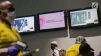 Layar televisi menampilkan suhu badan penumpang yang berada di Terminal 3 Bandara Soekarno Hatta, Tangerang, Banten, Rabu (15/5/2019). Hewan-hewan yang umumnya terinfeksi cacar monyet seperti primata, tupai, tikus atau hewan pengerat lainnya. (Liputan6.com/Faizal Fanani)