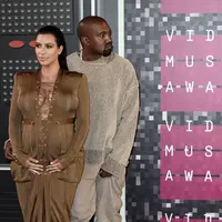 Kim Kardashian dan Kanye West (Bintang/EPA)
