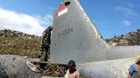 Puing pesawat Hercules TNI yang jatuh di Wamena
