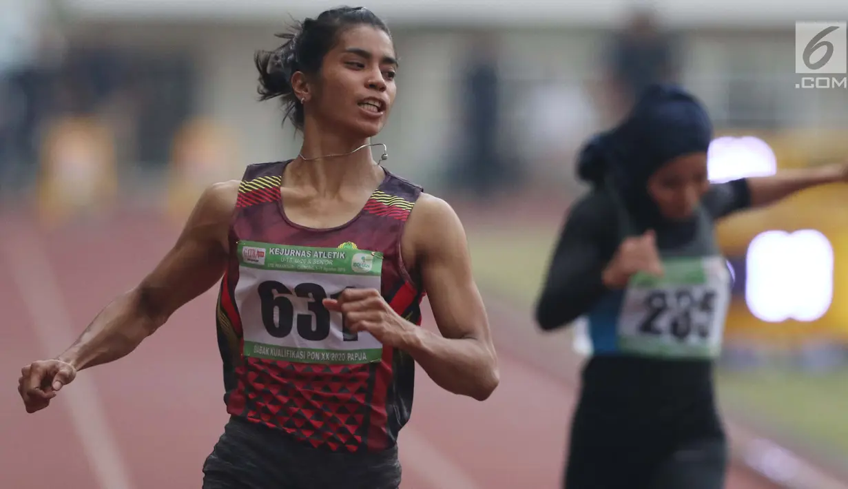 Atlet asal Maluku, Alvin Tehupeiory saat menyelesaikan lomba lari 100 meter putri senior Kejurnas Atletik U18, U20 dan Senior 2019 di Stadion Pakansari, Kab Bogor, Jumat (2/8/2019). Alvin Tehupeiory meraih posisi pertama dengan catatan waktu 11,64 detik. (Liputan6.com/Helmi Fithriansyah)
