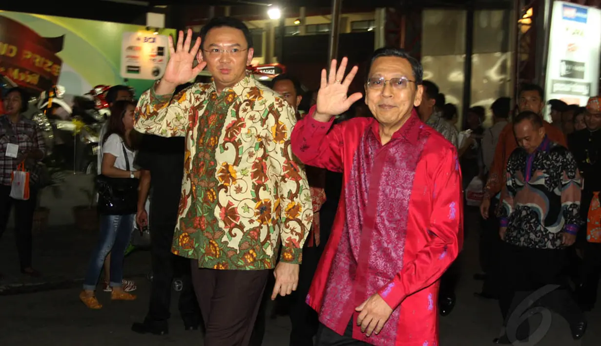 Boediono dan Ahok tiba di lokasi Jakarta Fair Kemayoran 2014, Senin (9/6/14). (Liputan6.com/Andrian M Tunay)