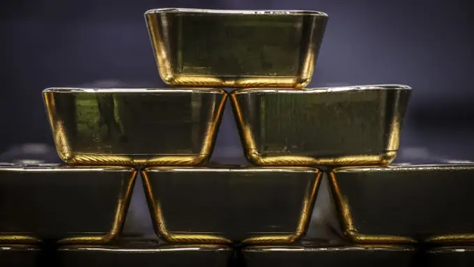 Ilustrasi Harga Emas Hari Ini di Dunia. Foto: DAVID GRAY | AFP