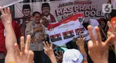 Calon Gubernur DKI Jakarta nomor urut tiga, Pramono Anung berkampanye sekaligus menyapa warga di kawasan Kebayoran Lama, Jakarta Selatan, Selasa (29/10/2024). (Liputan6.com/Angga Yuniar)