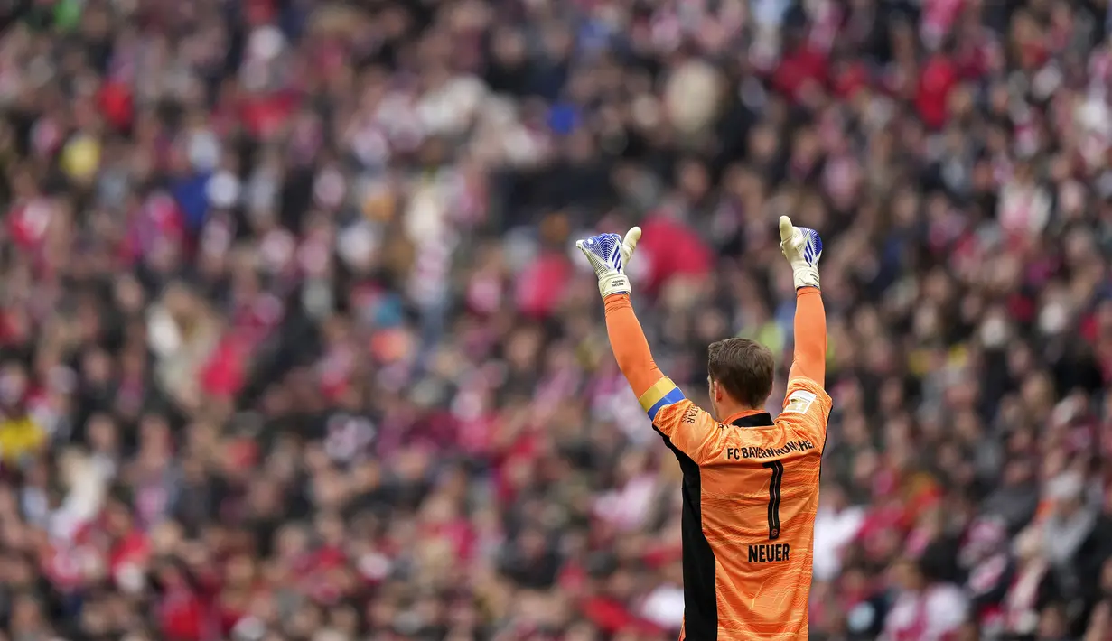 <p>Ini adalah momen juara yang tepat bagi Bayern. Mereka juara di depan pendukung sendiri dan mengalahkan sang rival abadi. (AP Photo/Matthias Schrader)</p>
