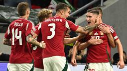 Tuan rumah Hungaria unggul lebih dulu pada menit ke-32 lewat gol Roland Sallai (kanan). (Attila KISBENEDEK/AFP)