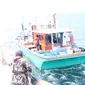 Kapal asing berbendera Malaysia diamankan di Perairan Selat Malaka dan kapal berbendera Filipina di ZEEI Laut Sulawesi, keduanya berhasil dibekuk Kapal Pengawas Perikanan KKP. (Liputan6.com/ Ajang Nurdin)