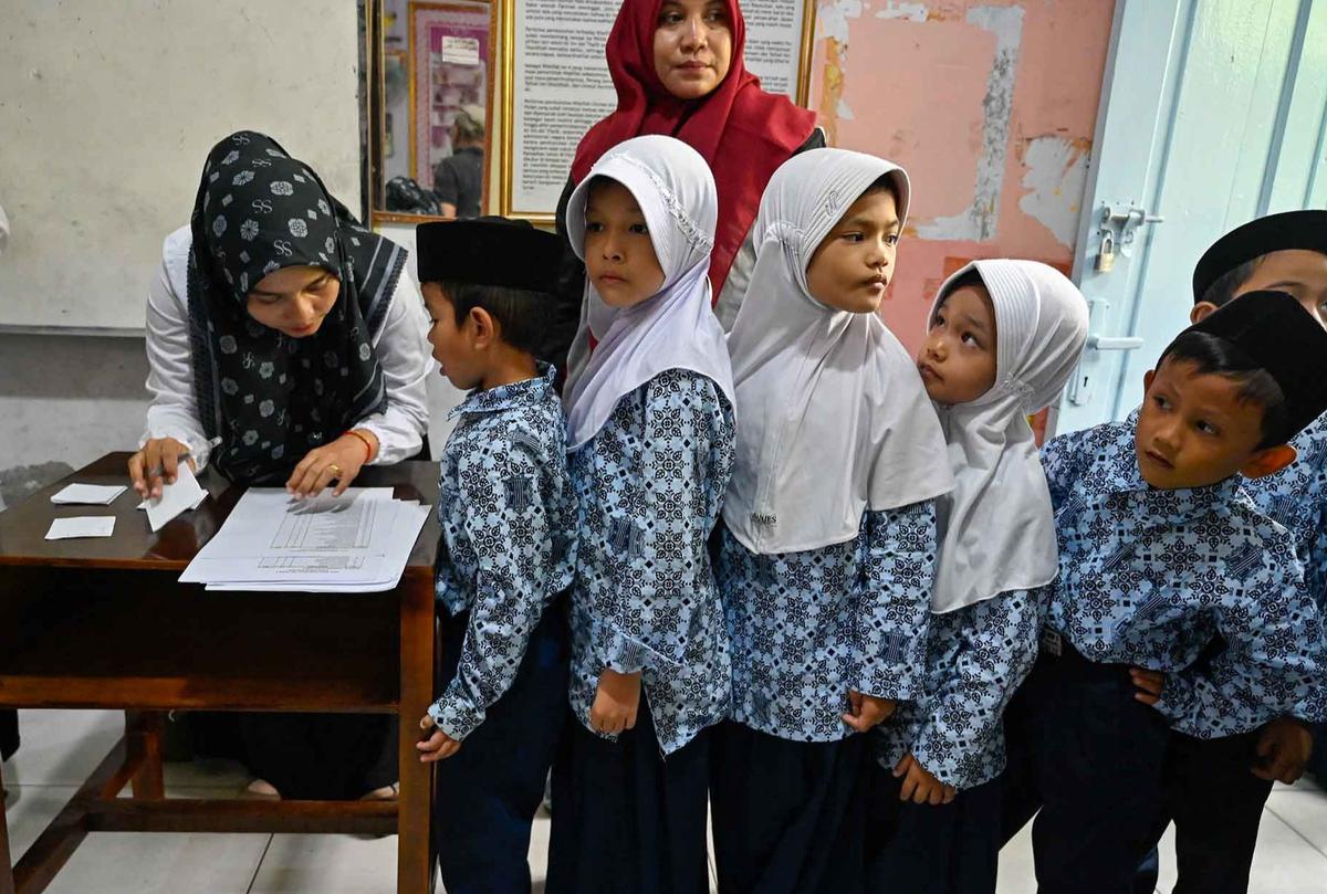 FOTO: Antusias Murid Madrasah Jalani Pemeriksaan Kesehatan Gratis