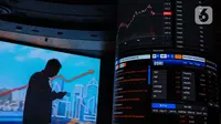 Indeks Harga Saham Gabungan (IHSG) ditutup melemah 78,87 poin atau 1,03% ke level 7.563 pada sesi terakhir perdagangan pada Rabu (2/10/2024). (Liputan6.com/Angga Yuniar)