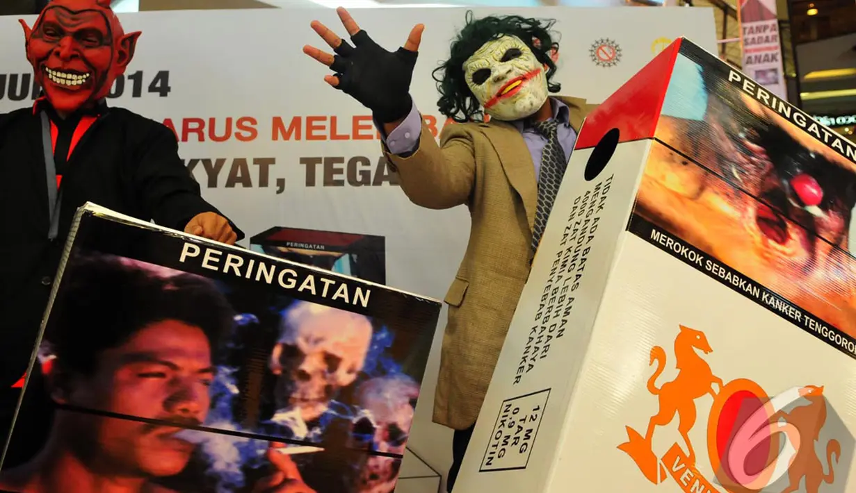 Aksi teatrikal advokasi publik bertajuk "Indonesia Harus Melek Bahaya Merokok", Jakarta, Selasa (24/06/2014) (Liputan6.com/Andrian M Tunay) 