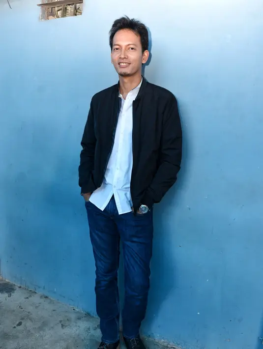 "Sangat menikmati dari mulai gendong dia sampai tidur, ganti popok, dan lihatin dia doang, rasanya bahagia doang," ungkap Fedi Nuril saat ditemui di kawasan Kapten Tendean, Jakarta Selatan, Jumat (20/1/2017). (Adrian Putra/Bintang.com)