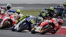 Balapan MotoGP San Marino di Sirkuit Misano, Minggu (13/9/2015), berlangsung penuh drama dan kejutan karena diselingi hujan dan dua kali ganti motor. (Reuters/Max Rossi)