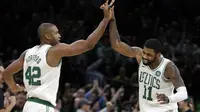 Aksi Irving saat membantu Celtics Kalahkan Raptors (AP)