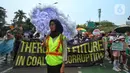 Peserta mengikuti aksi pawai Global Climate Strike di Taman Menteng, Jakarta, Minggu (17/9/2023). Aksi yang dilakukan oleh gabungan komunitas peduli lingkungan itu untuk menyuarakan isu krisis iklim yang mengancam kehidupan makhluk hidup serta meminta pemerintah untuk serius menangani krisis iklim dan kelestarian lingkungan. (Liputan6.com/Angga Yuniar)