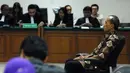 Ia berkukuh bahwa pencairan Fasilitas Pinjaman Jangka Pendek (FPJP) dan penetapan Bank Century sebagai bank gagal berdampak sistemik adalah suatu kebijakan yang tidak dapat dipersalahkan, PN Tipikor, Jaksel, Rabu (16/7/2014) (Liputan6.com/Miftahul Hayat)
