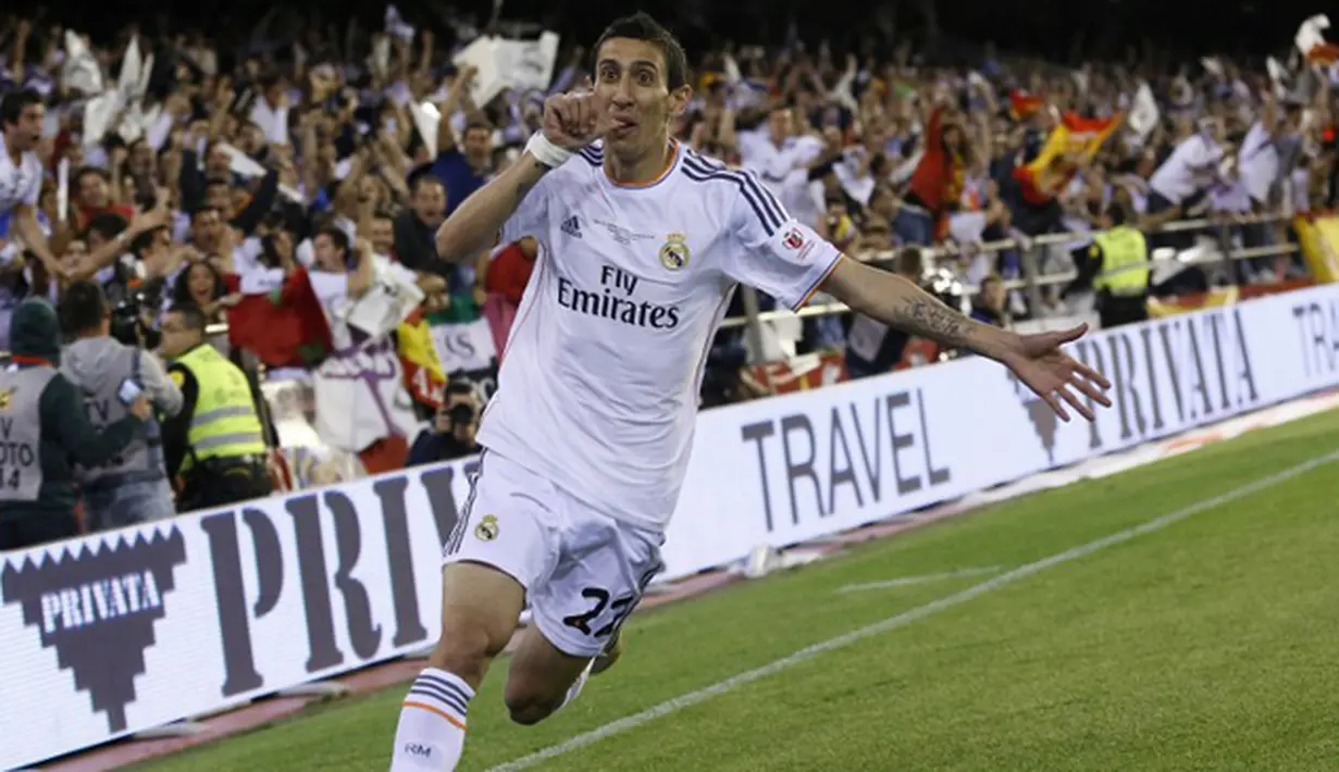 Gelandang Real Madrid, Angel Di Maria merayakan gol ke gawang Barcelona pada laga Copa del Rey di Mestalla, Spanyol, Rabu (16/4/2014). Di Maria pindah dari Madrid ke MU dengan memecahkan rekor transfer Liga Inggris. (AFP Photo/Cesar Manso)