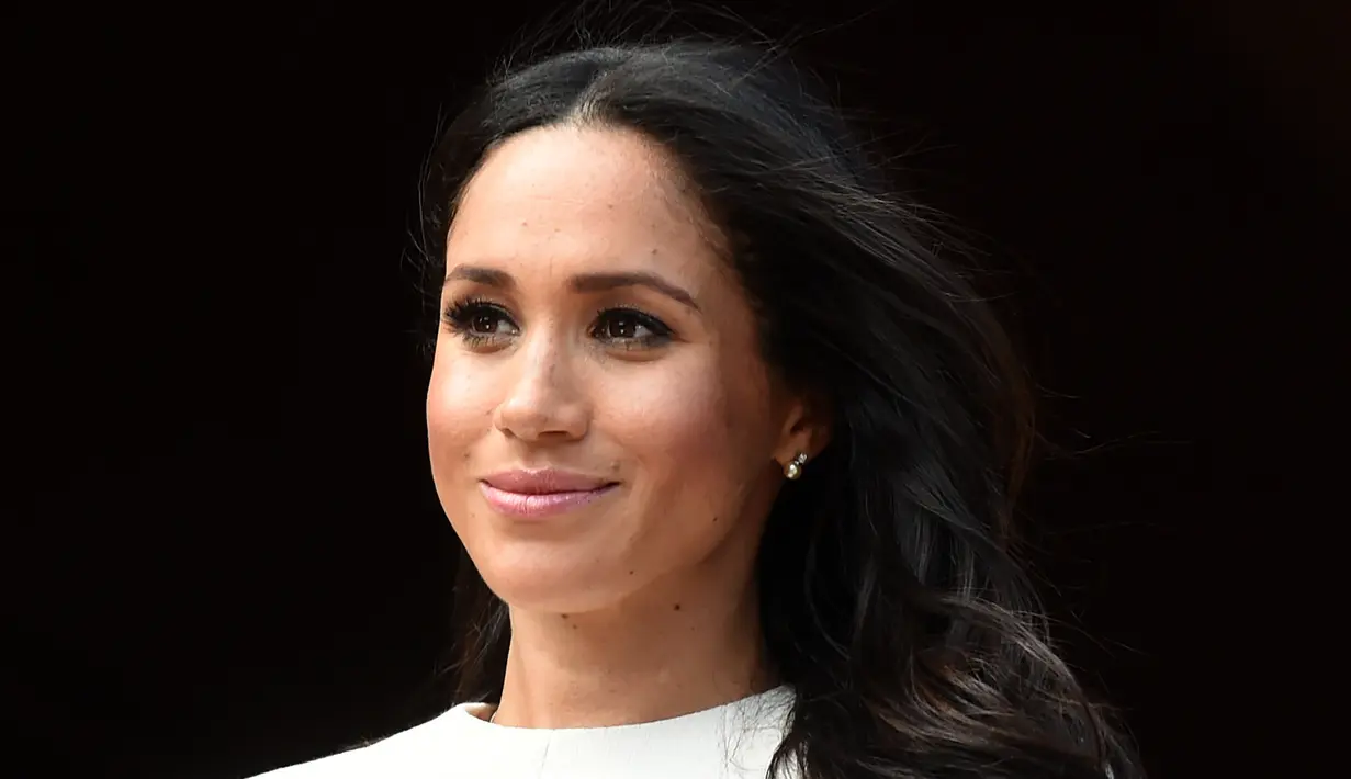 Dilansir dari Cosmopolitan, sang paman, Michael Markle, beberapa waktu lalu bersedia diwawancarai oleh sebuah tabloid. (EDDIE MULHOLLAND  POOL  AFP)