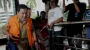 Bupati Lombok Barat nonaktif, Zaini Arony saat tiba di gedung KPK, Jakarta, Rabu (15/4/2015). Zaini diperiksa terkait kasus dugaan pemerasan terkait permohonan izin pengembangan kawasan wisata di daerahnya. (Liputan6.com/Andrian M Tunay)