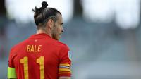 Gareth Bale. Striker Timnas Wales ini telah mencetak 33 gol untuk negaranya sebelum turnamen Euro 2020 berlangsung. Di laga perdana melawan Swiss yang berakhir 1-1, ia belum mampu menyumbang gol untuk mempertajam rekornya. (Foto: AP/Pool/Dan Mullan)