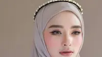 Ilustrasi Inara Rusli dengan Hijab/https://www.instagram.com/mommy_starla