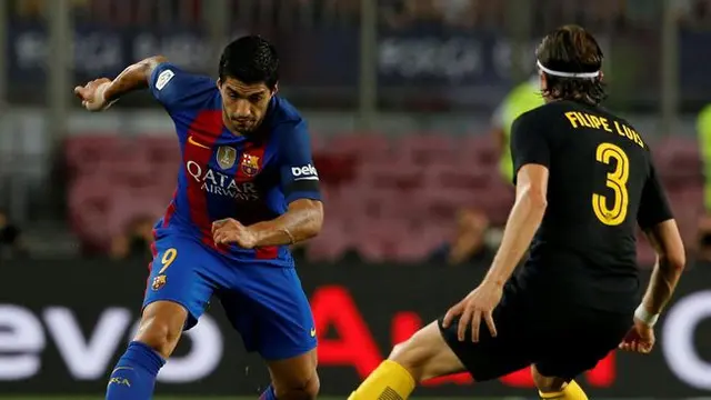 Luis Suarez dan Felipe Luis