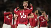 Penyerang Manchester United, Rasmus Hojlund, mencetak satu gol dan membantu timnya menang 4-1 atas Athletic Bilbao pada laga leg kedua semifinal Liga Europa di Old Trafford, Jumat (9/5/2025) dini hari WIB. Hasil tersebut membuat MU menang agregat 7-1 dan lolos ke final. (AP Photo/Dave Thompson)
