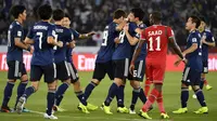 Timnas Jepang meraih kemenangan 1-0 atas Oman pada laga kedua Grup F Piala Asia 2019, di Sheikh Zayed Sports City, Abu Dhabi, Minggu (13/1/2019). (AFP/Khaled Desouki)