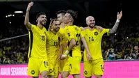 Skuad Malaysia berpesta merayakan kemenangan telak 4-0 atas Vietnam pada Kualifikasi Piala Asia 2027 di Kuala Lumpur, Selasa (10/6/2025) malam WIB. (Dok. Official Malaysia National Team)