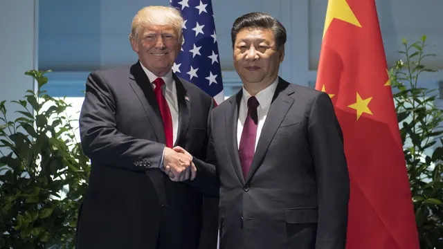 Presiden Donald Trump dan Presiden Xi Jinping di G20 (AP)