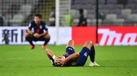 Ekspresi pemain Thailand sesaat setelah kalah 1-2 dari China di babak 16 besar Piala Asia 2019 di Hazza bin Zayed Stadium, Al Ain (20/1/2019). (AFP/Giuseppe Cacace)