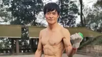 Zou Heping yang memiliki tubuh berotot (Sumber scmp.com).